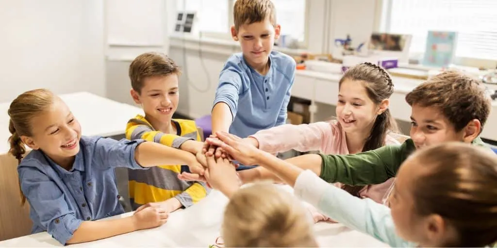 group of tweens working together on free entrepreneurship curriculum