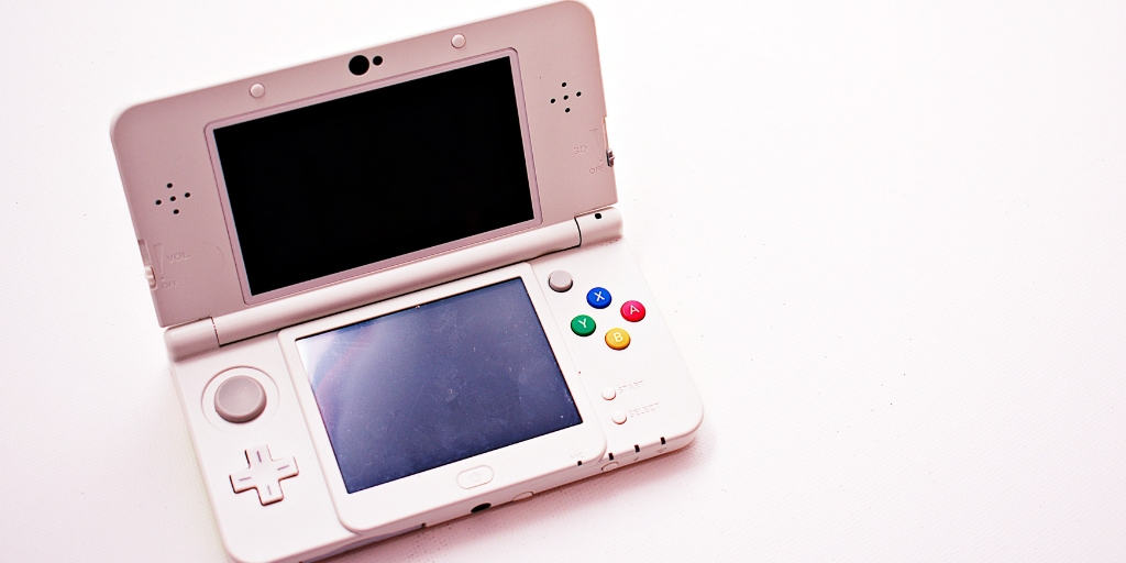 pink, nintendo-looking game console