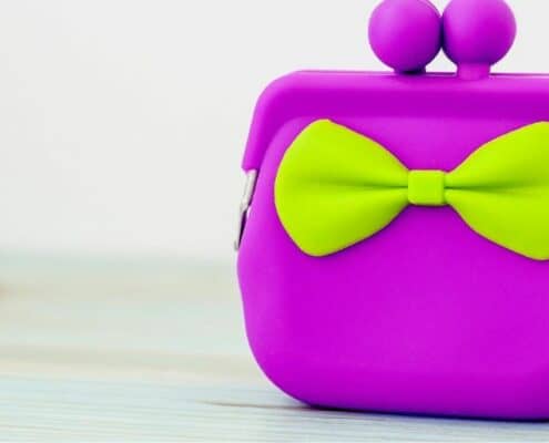 kids purple purse with green bow tie
