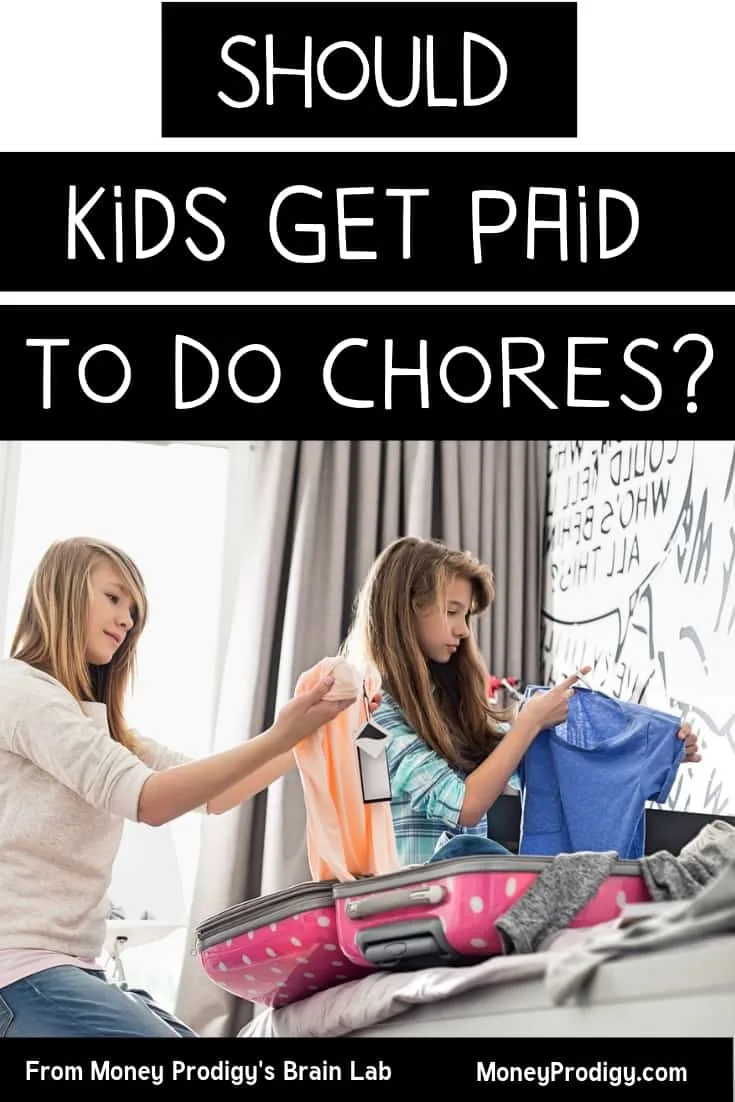two kids folding laundry to do chores off their chore list with text overlay "should kids get paid to do chores?"