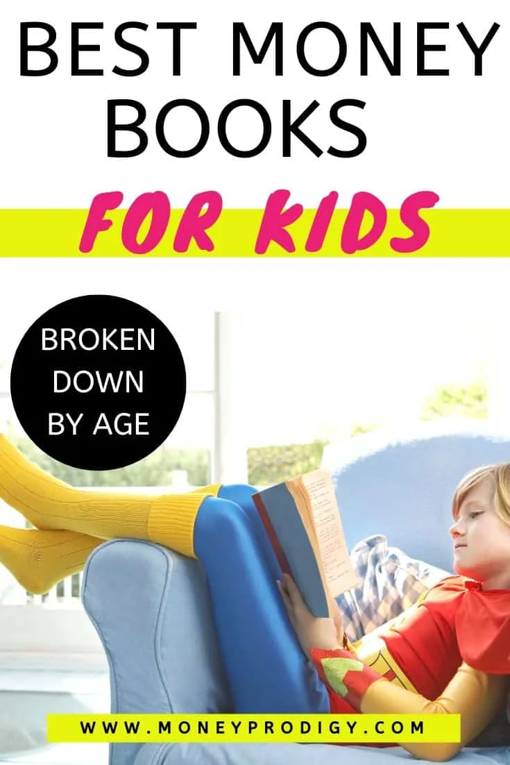 young kid reading money book on couch in superman outfit, text overlay "best money books for kids broken down by age"