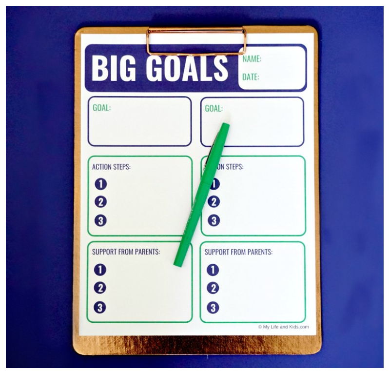 Screenshot of big goals downloadable worksheet for teens on navy blue background with green pen