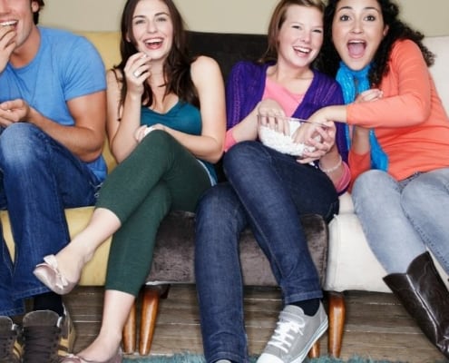 group of teens at party, doing teen party games