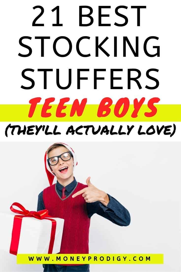 teen boy holding up a present and smiling, text overlay "21 best stocking stuffers for teen boys (they'll actually use and love)"