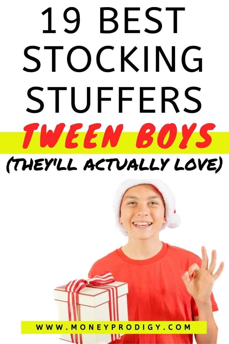 tween boy in red shirt and Santa hat, holding white present, smiling, text overlay 