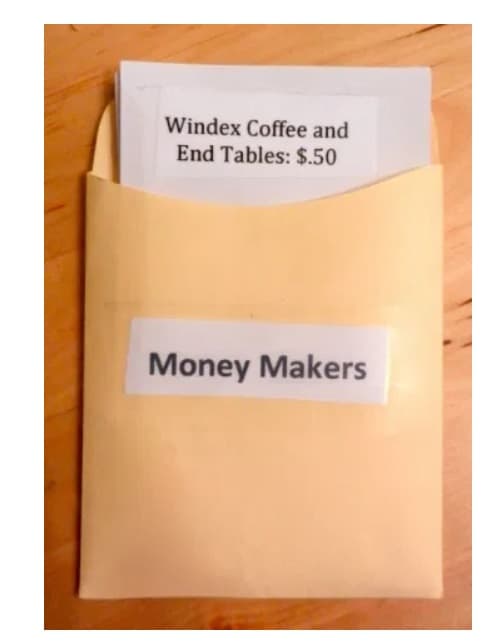 screenshot of chores for money manila envelope with money inside