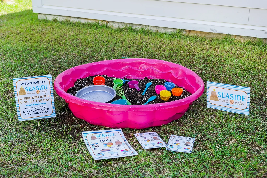 kiddie pool with mud in it and mud cafe free printable sign, great backyard activity for kids