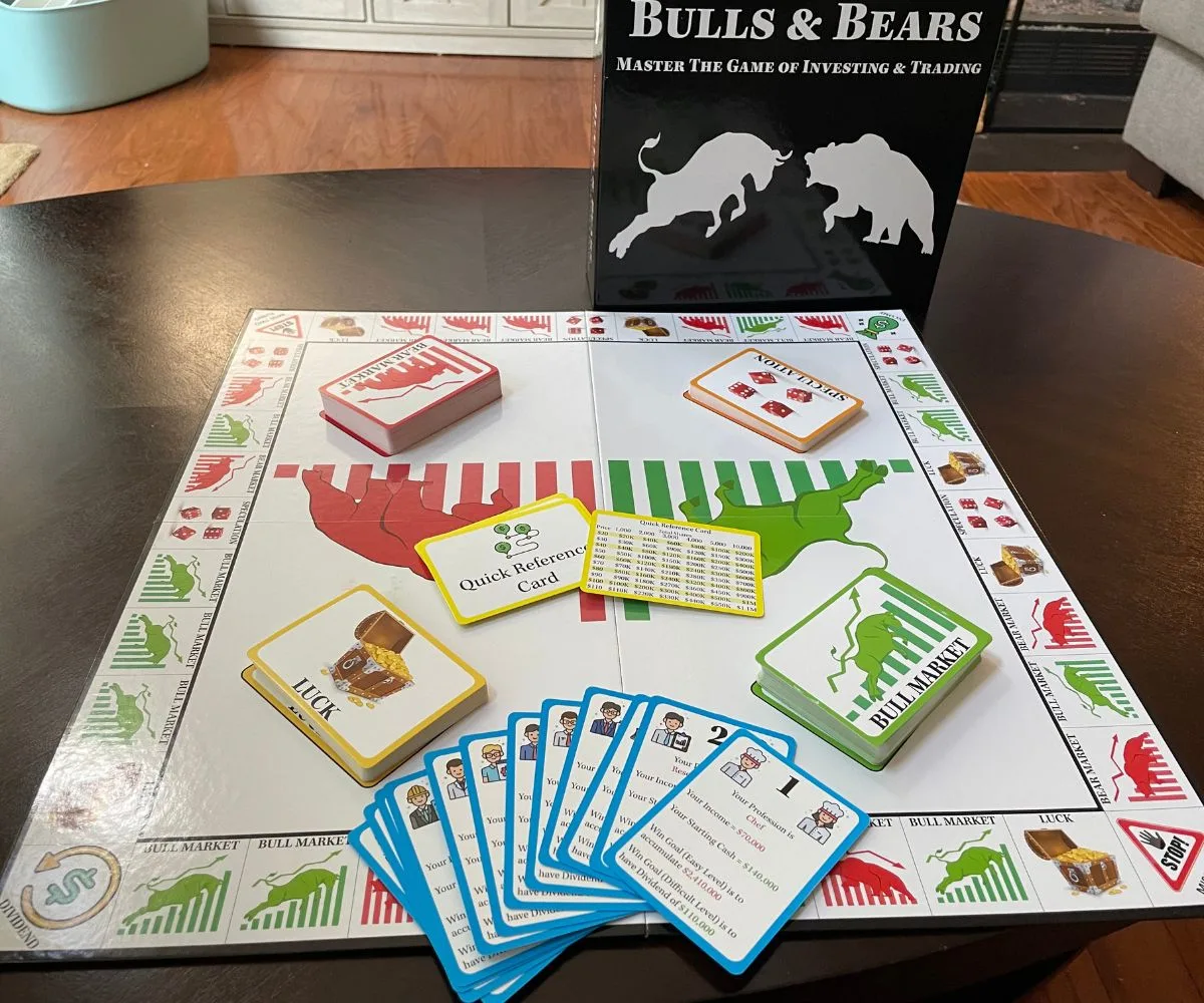 Black and white cover, with bright white, green, and red board game displayed on dark table