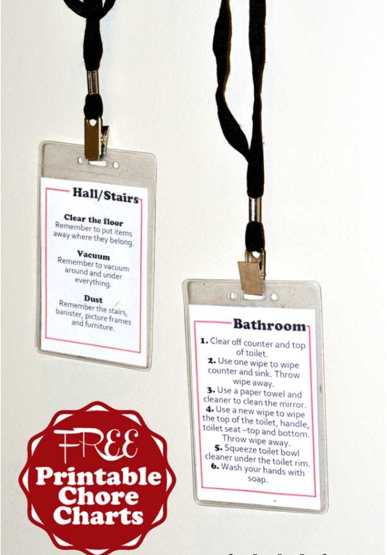 lanyards with clear ID holder filled with chore cards, hanging on wall