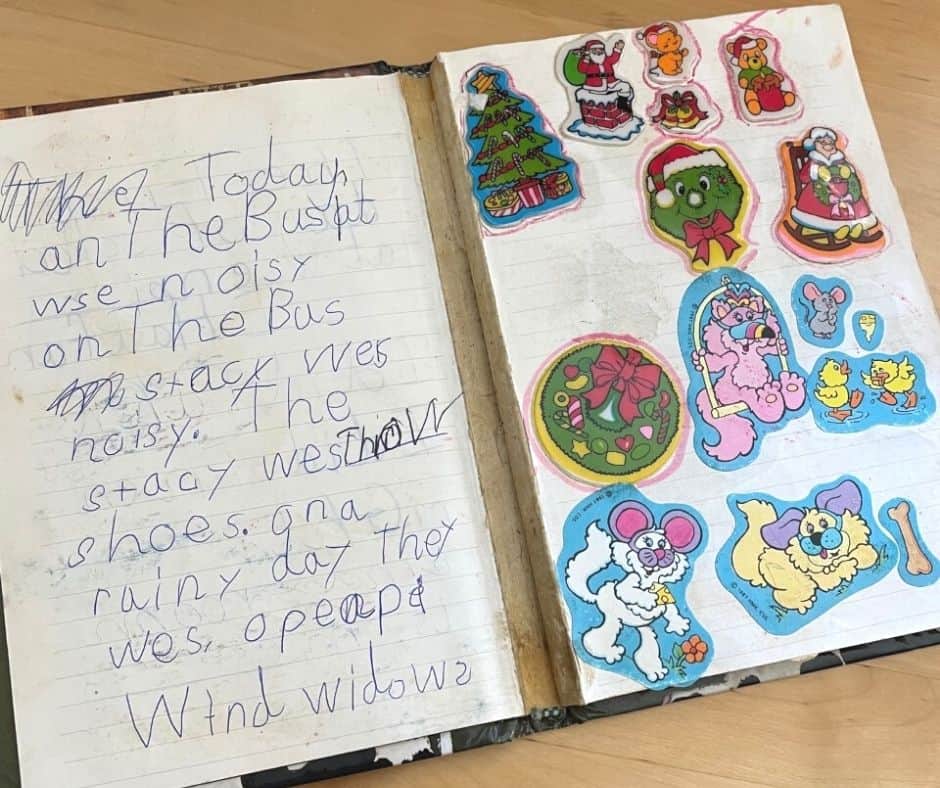 second grade diary with very young-looking writing in pen and lots of stickers