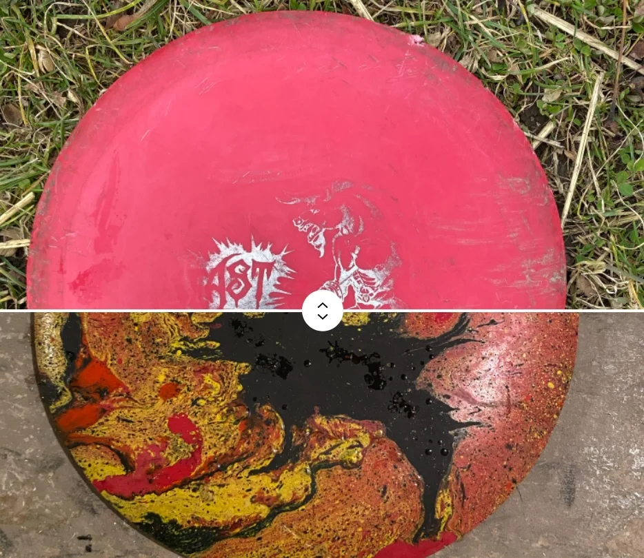 two halves of the same frisbee, one original red, and one painted marbled