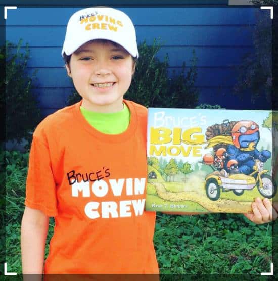 10 year old boy with hat and orange shirt on