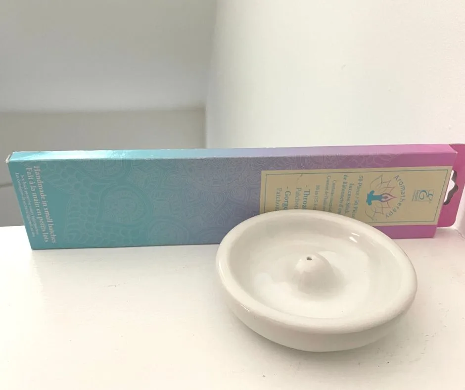 pastel rainbow box with white ceramic incense burner