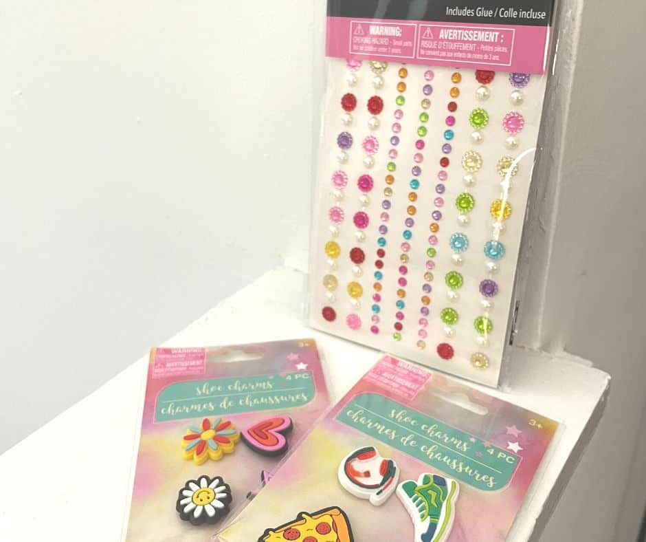 bright gem stickers and shoe charms, white background