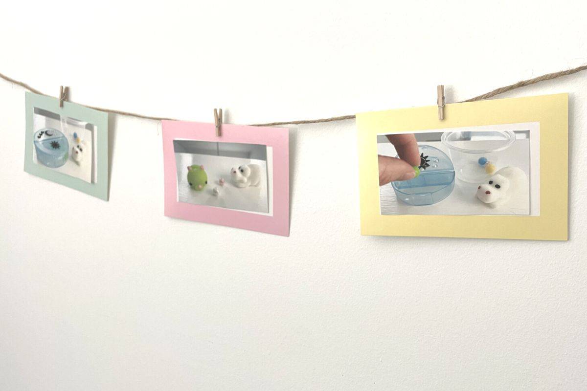 three photos of product being used clipped to photo garland