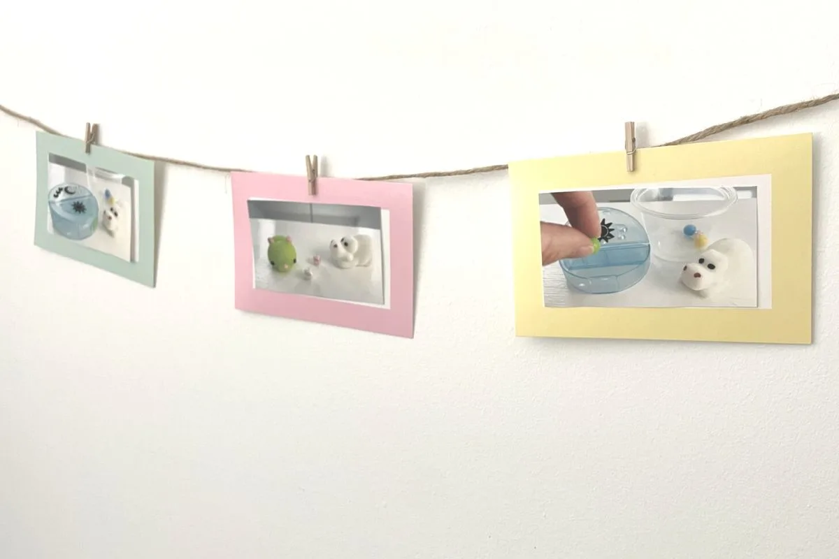 three photos of product being used clipped to photo garland