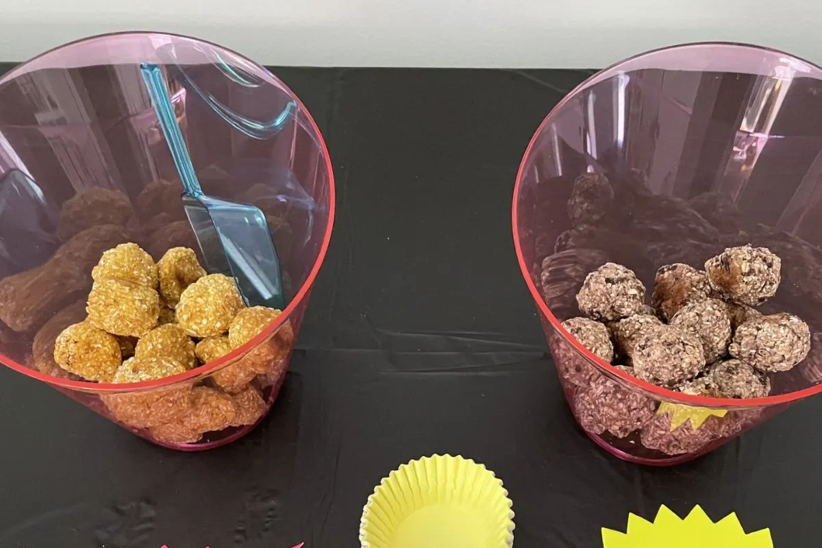 two buckets with two different homemade doggy treats to sell