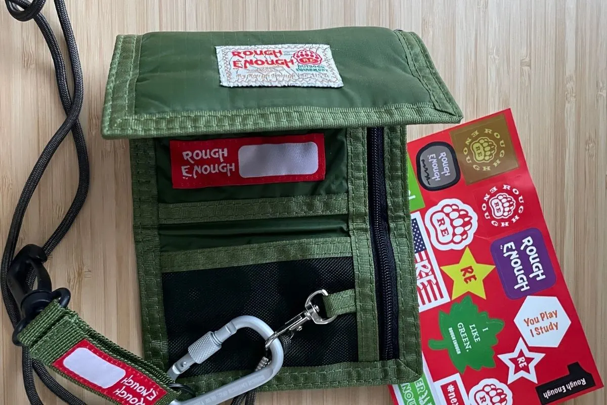 inside of military green wallet with lanyard and clip