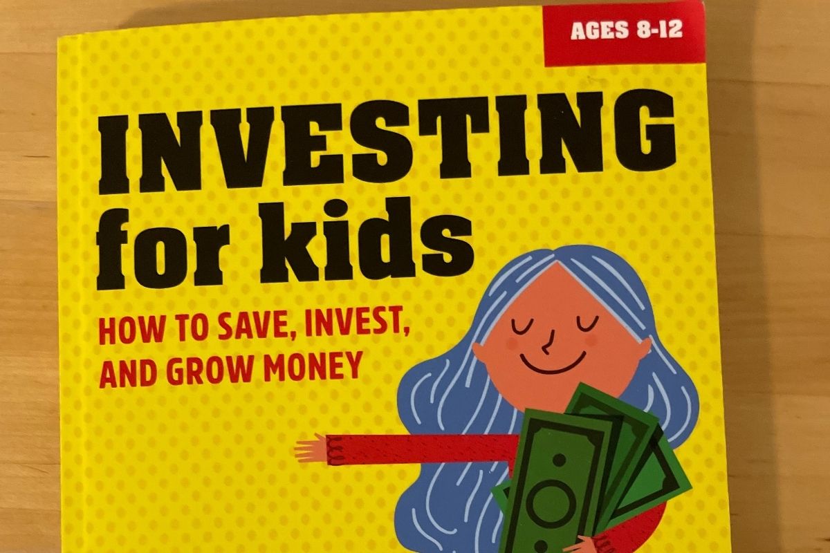 bright yellow Investing for Kids cover with cartoon girl holding money