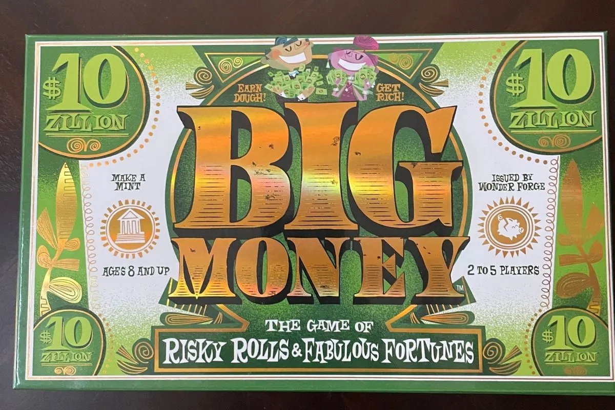 board game box that looks like huge $10 ziiion bill
