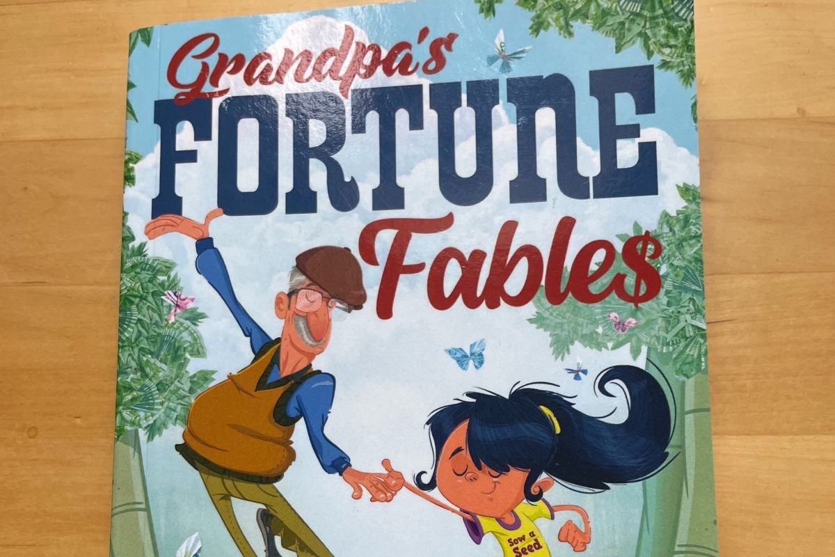book cover for Grandpa's Fortune Fables with cartoon grandpa holding granddaughter's hand