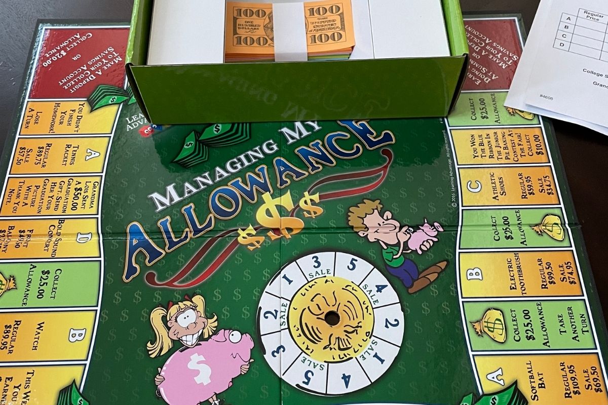 dark green, light green, and yellow Managing My Allowance board game