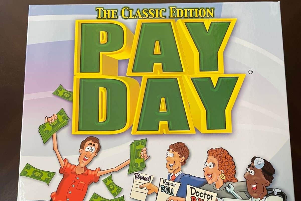 green and yellow board game cover with cartoons with money