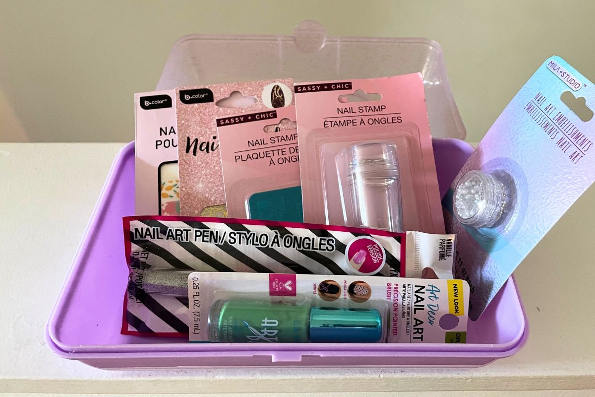 purple caboodle filled with nail art supplies