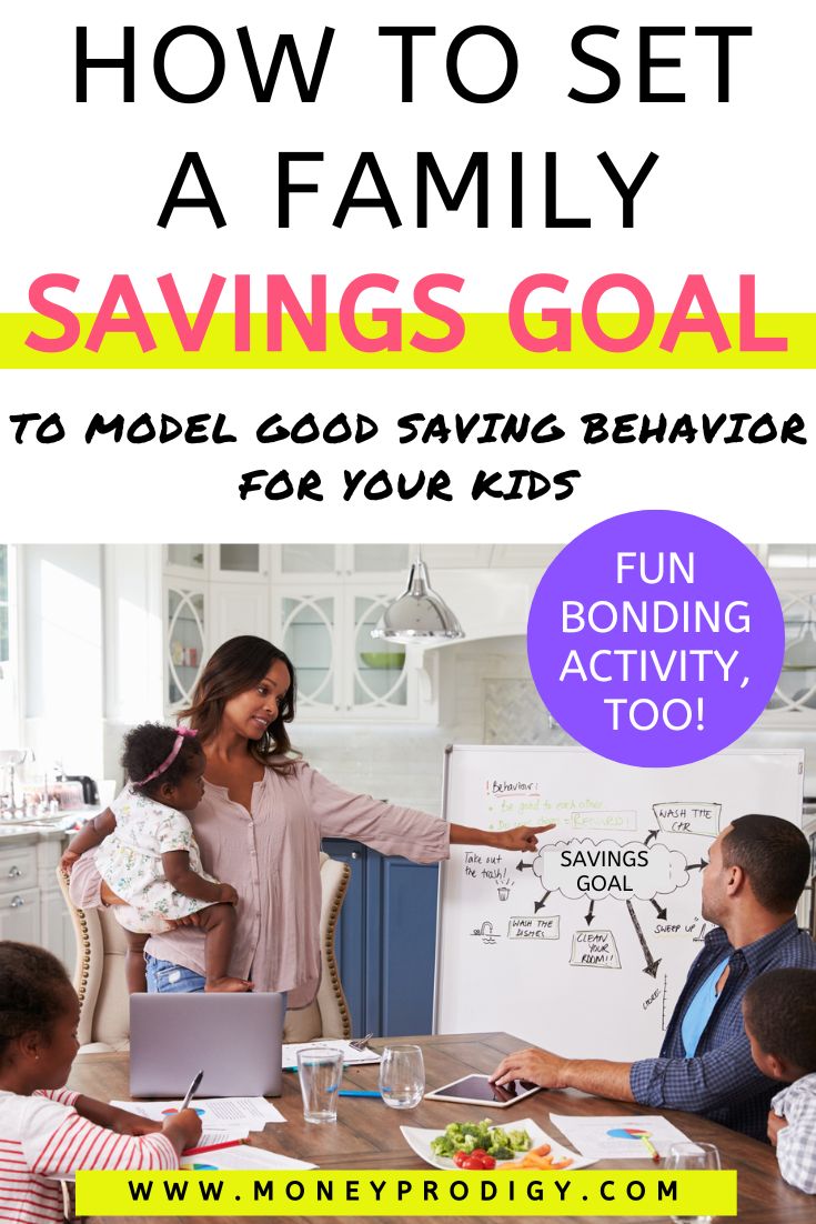 family sitting around kitchen table with large white board with savings goal, text overlay "ho to set a family savings goal"
