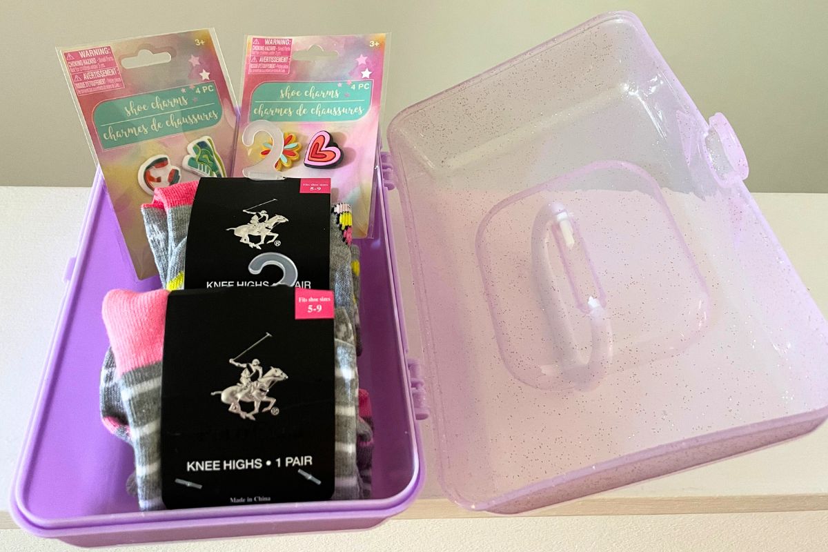 purple caboodle filled with foot accessories for tweens
