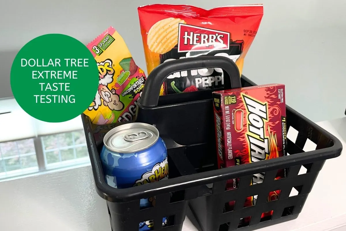 Black shower caddy filled with extreme tasting snack foods and a Warheads soda can
