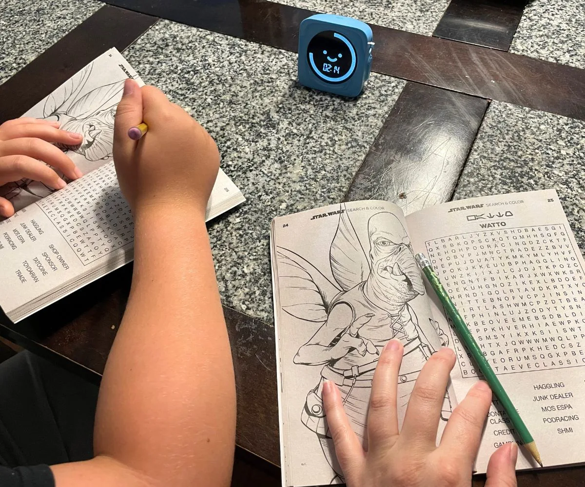 tween and mother playing Word Search competition with Star Wars word searches and light blue timer