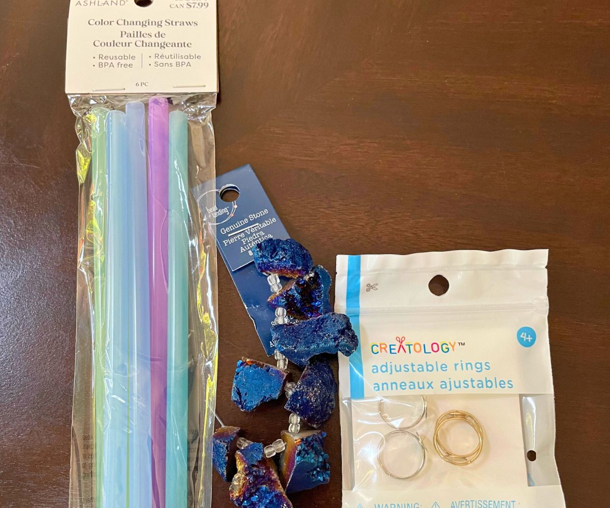 colorful color changing straws, gemstones on a thread, and adjustable rings