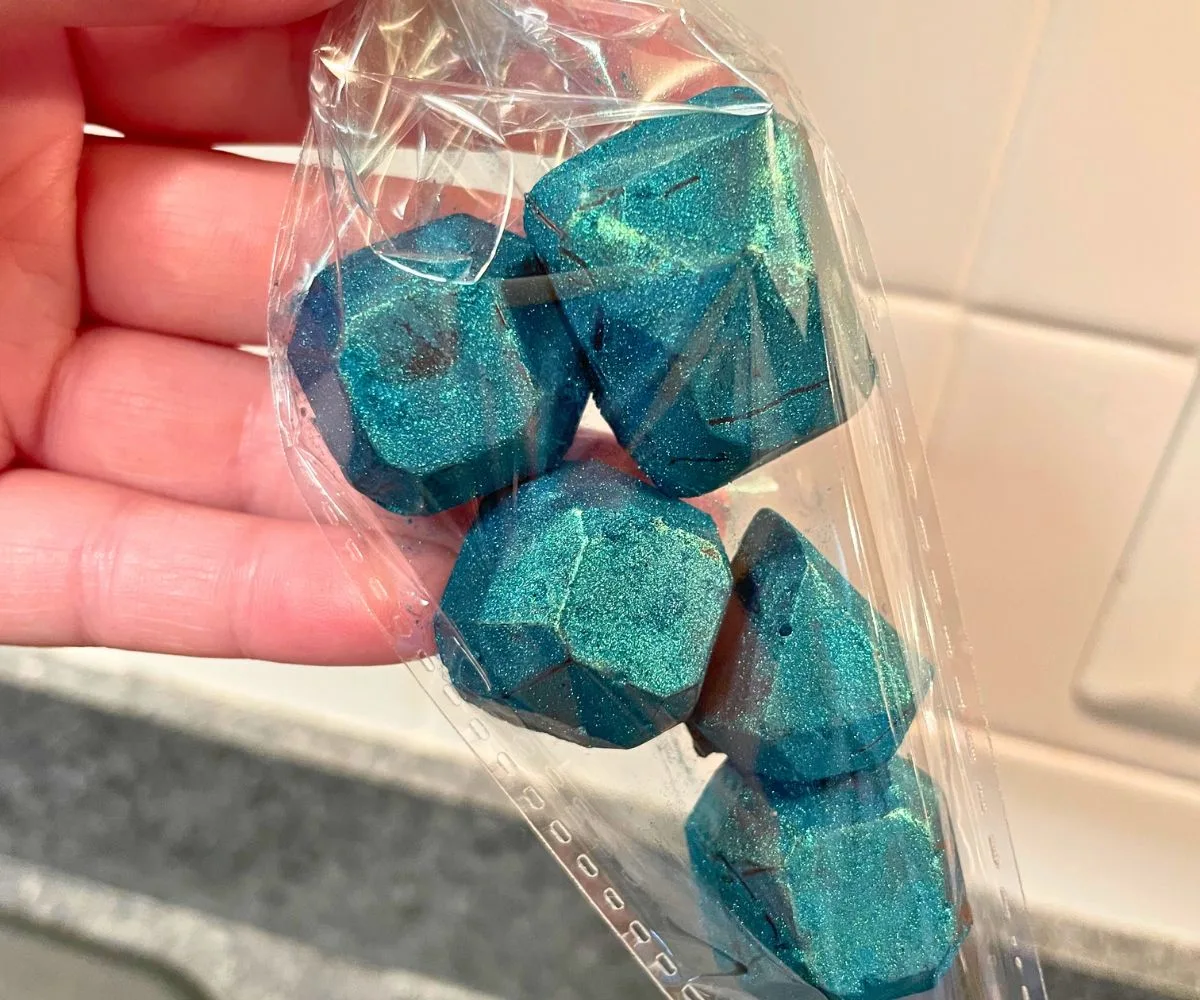 teal glittery chocolate gemstones in clear plastic cone
