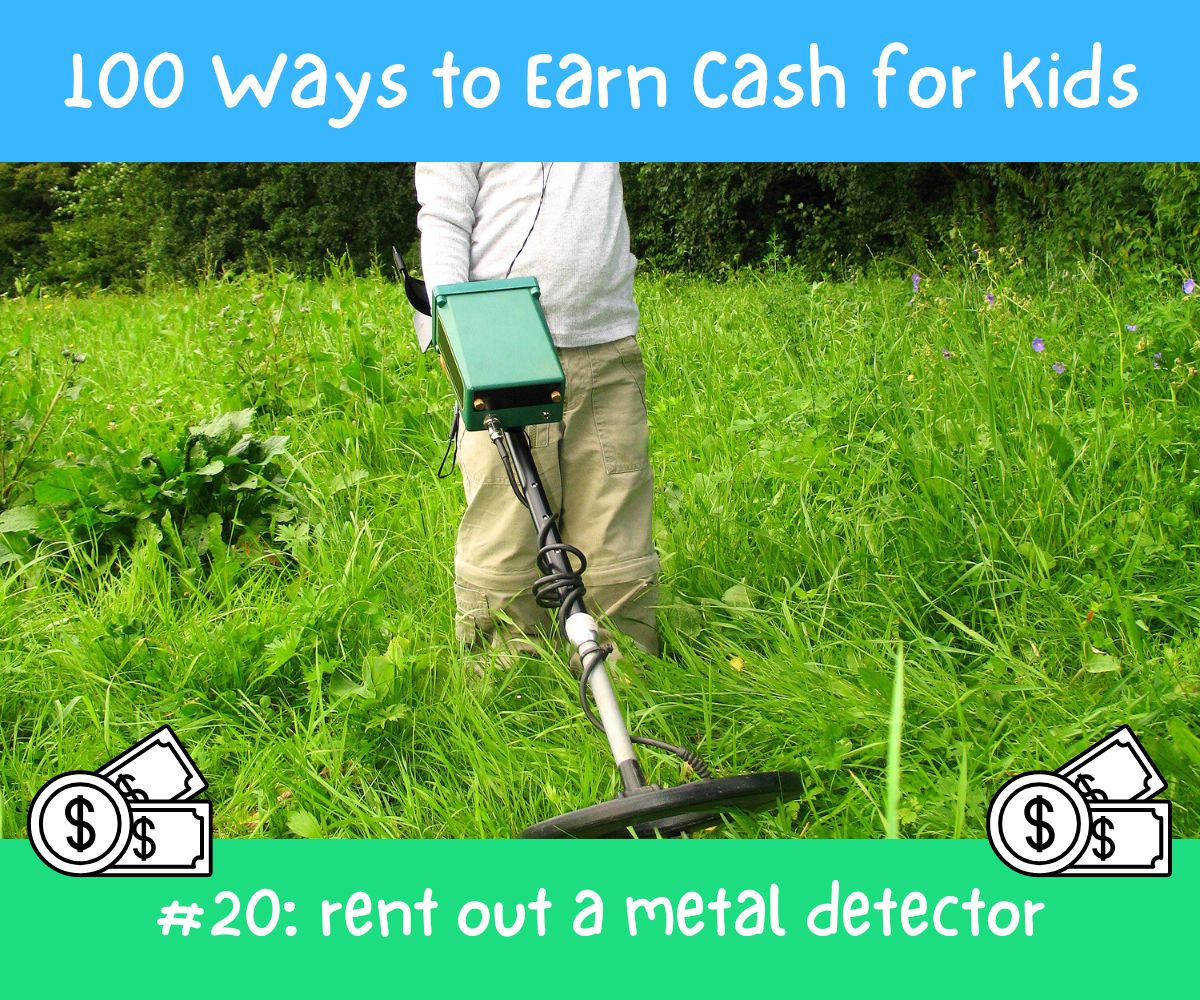 tween boy holding metal detector in field