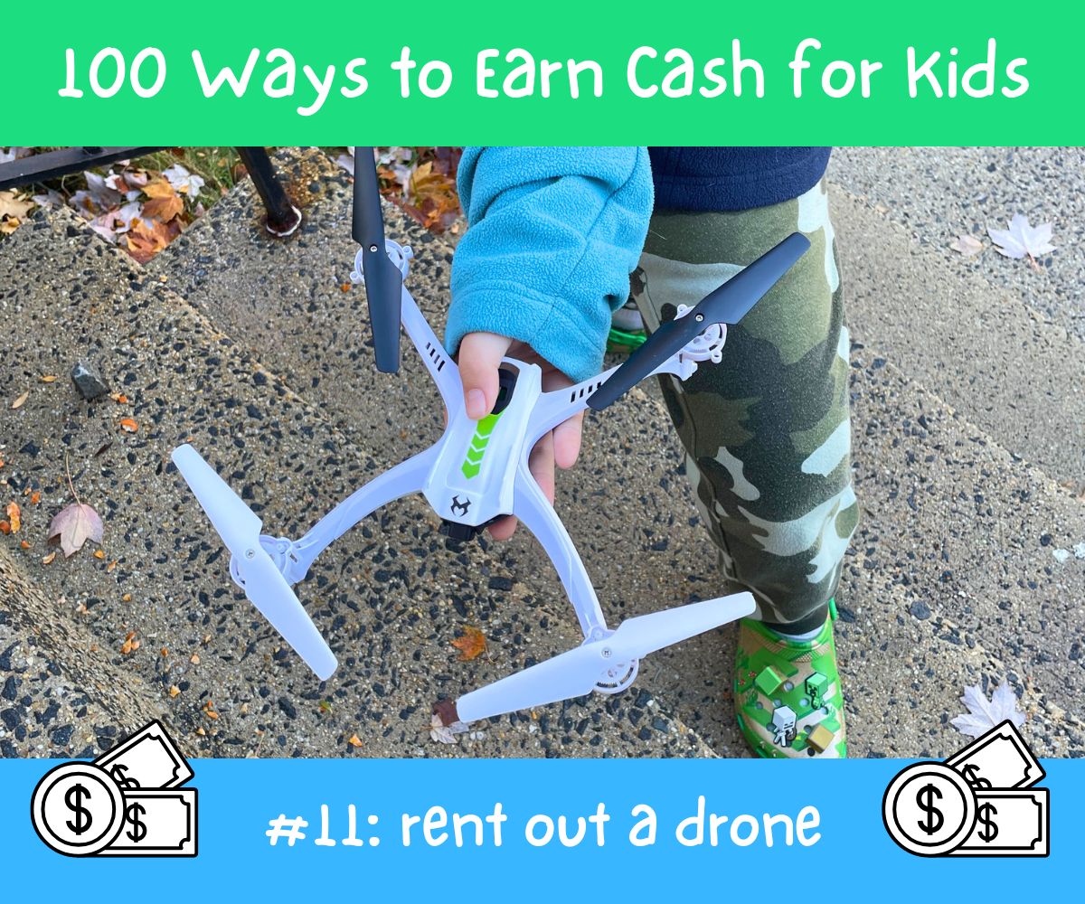 tween boy holding drone outside