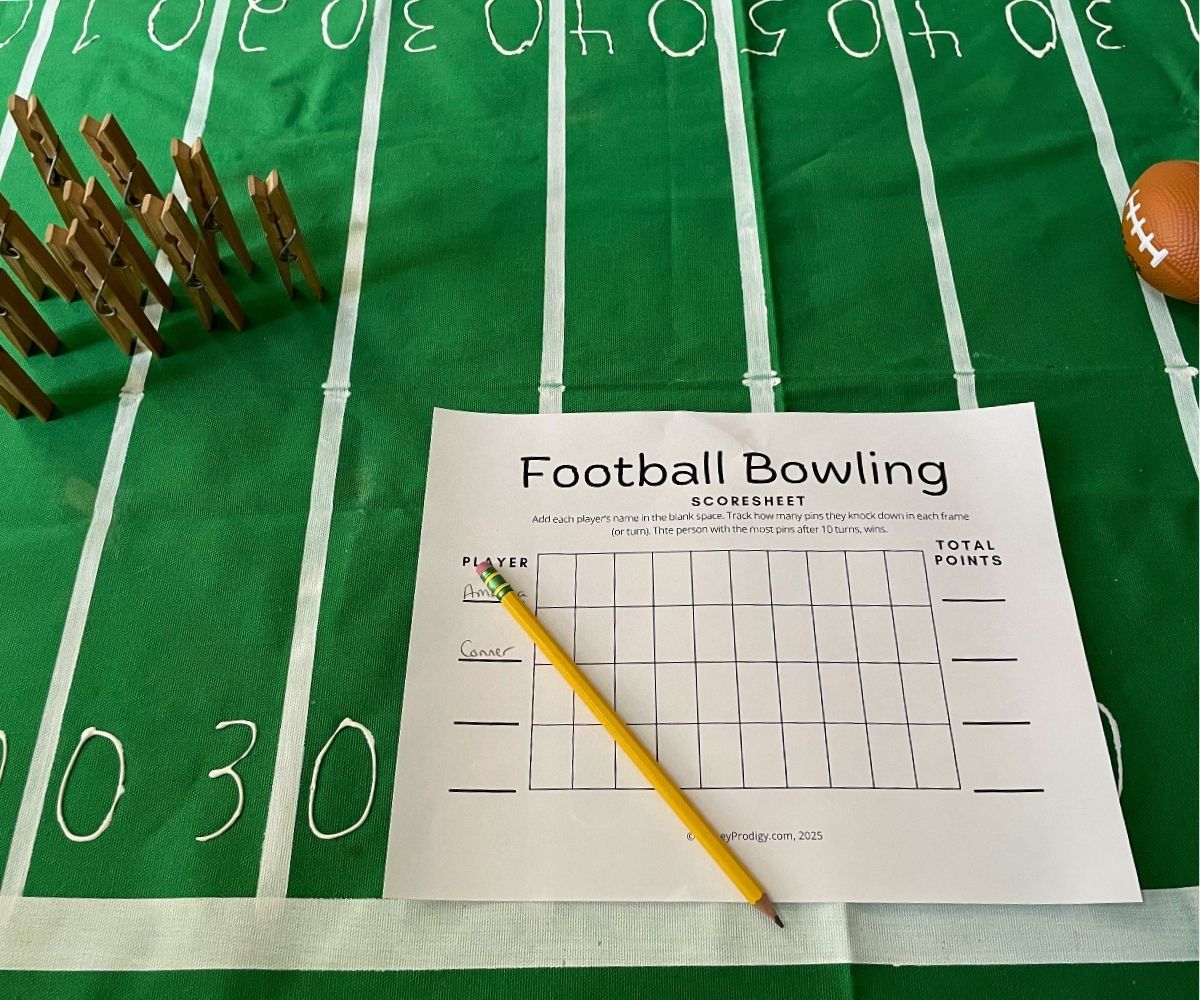 free printable football bowling game with toy football and 10 clothespins standing up