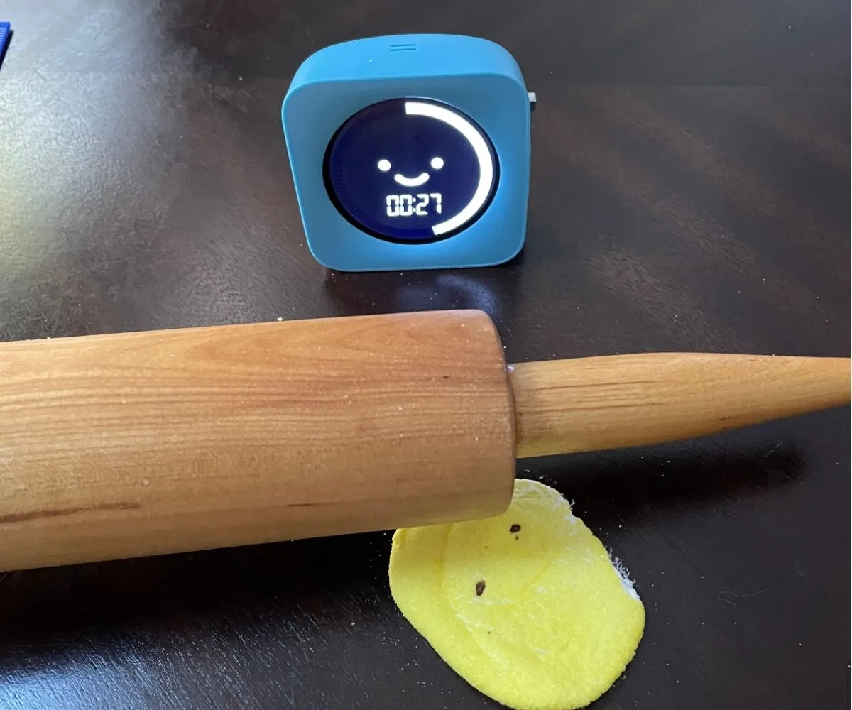 flattened Peeps under rolling pin, with 27 seconds left on timer