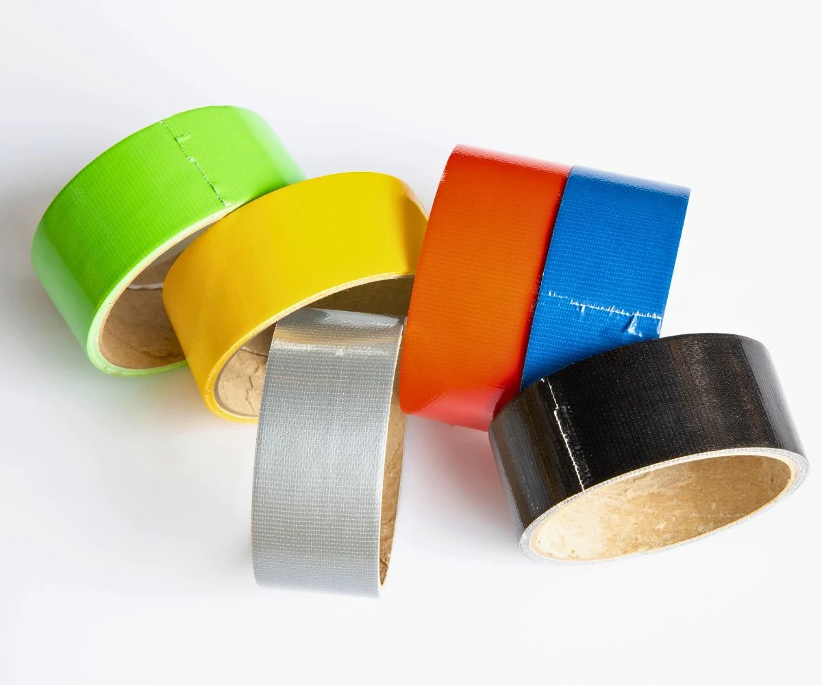 different colorful duct tapes on white table