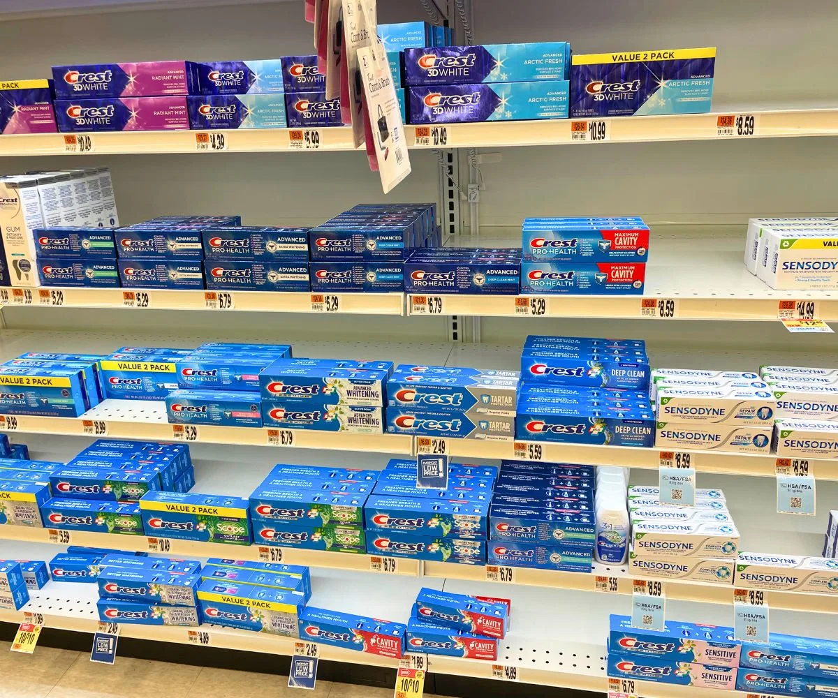 shelf filled with tons of toothpaste varieties