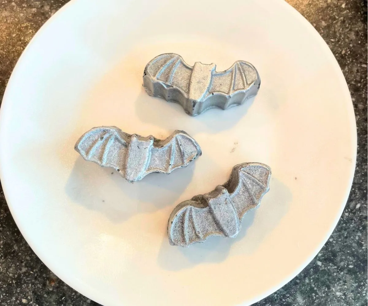 silvery glimmery bats on white plate