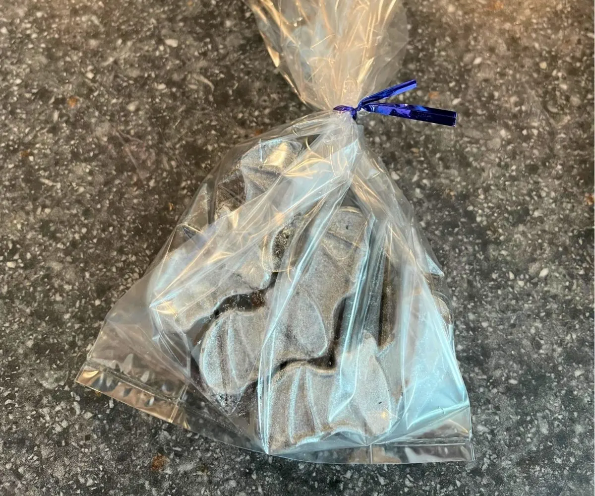 silver glimmery bat candies in a clear plastic bag
