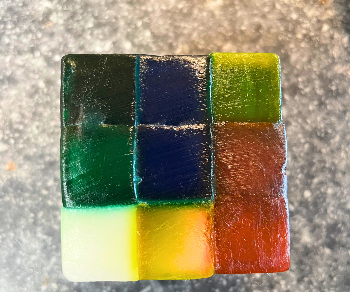 same puzzle cube, but wiped up so the smudges are gone and it's smooth