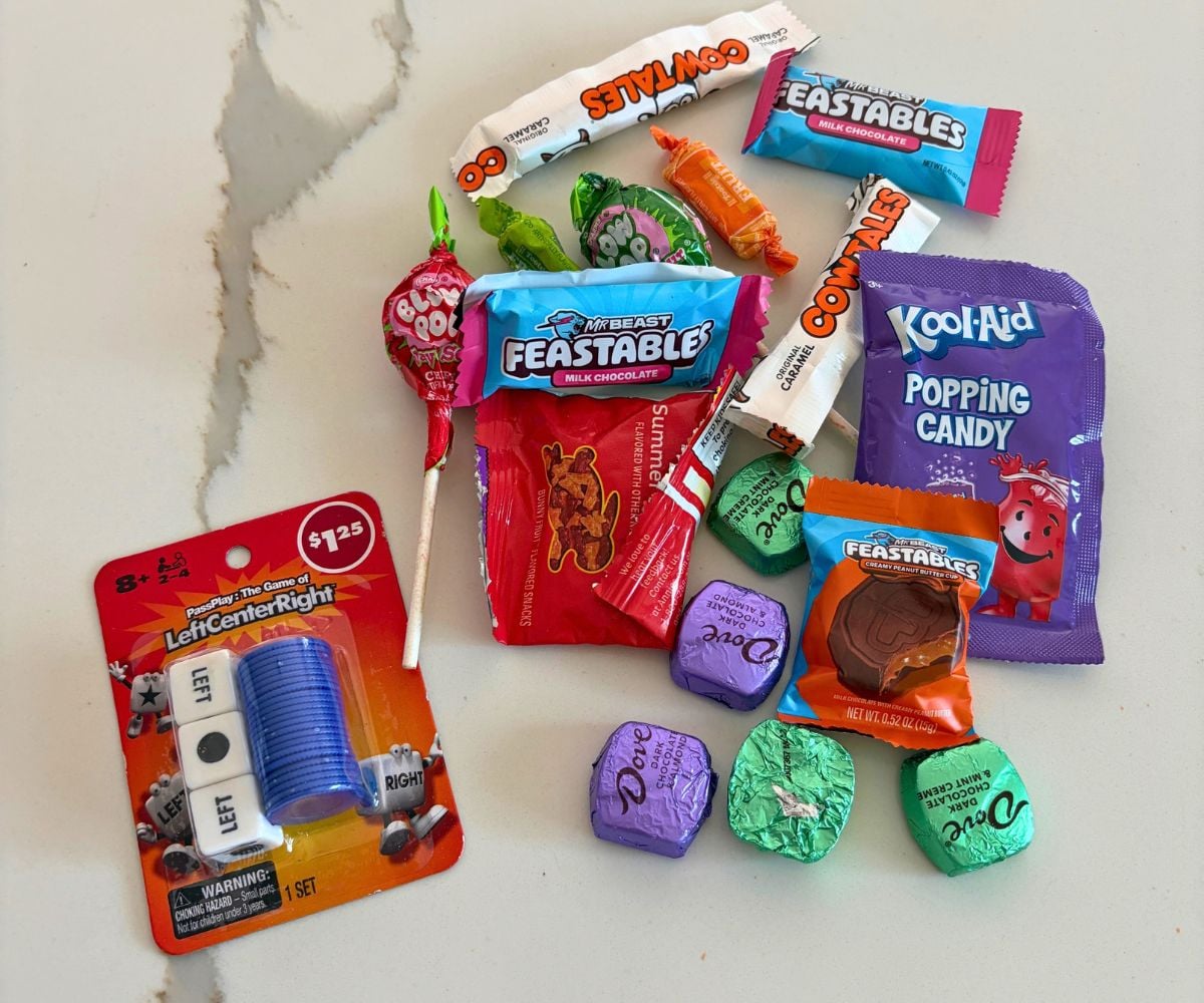LeftCenterRight package with a bunch of candy pieces on white marble counter