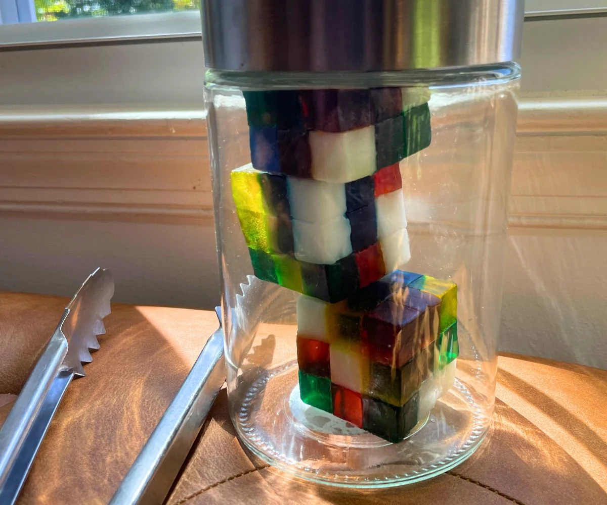 jar of puzzle cube soaps with tongs