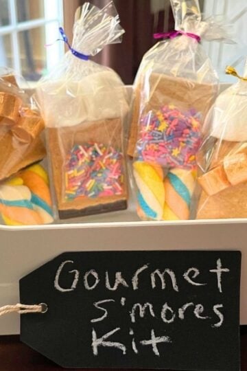 white container filled with gourmet s'mores kits for kids to make and sell