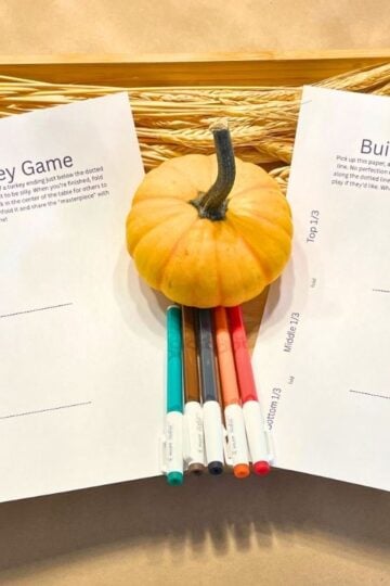 free printable thanksgiving table games on light wooden tray with wheat and mini pumpkin