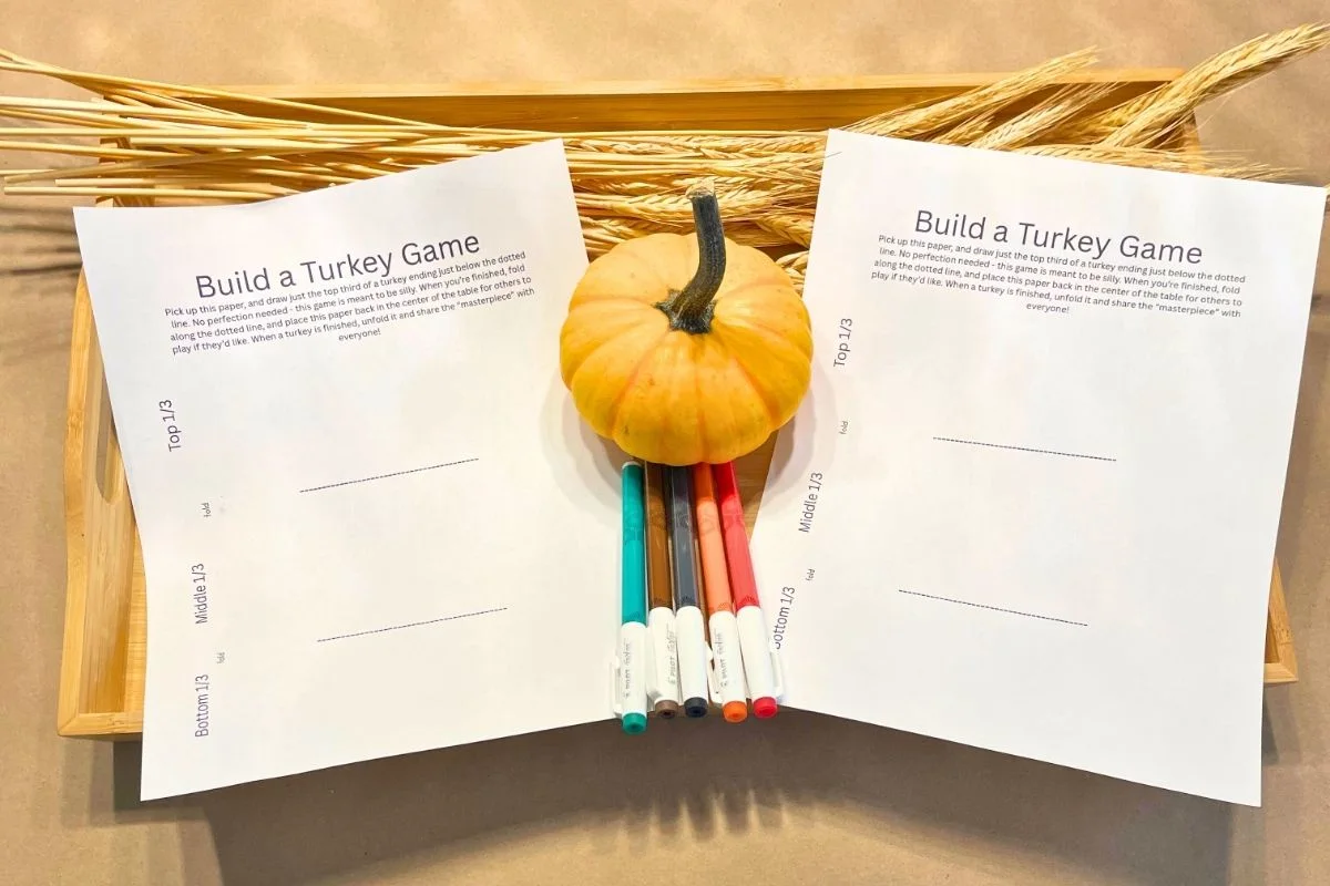 free printable thanksgiving table games on light wooden tray with wheat and mini pumpkin
