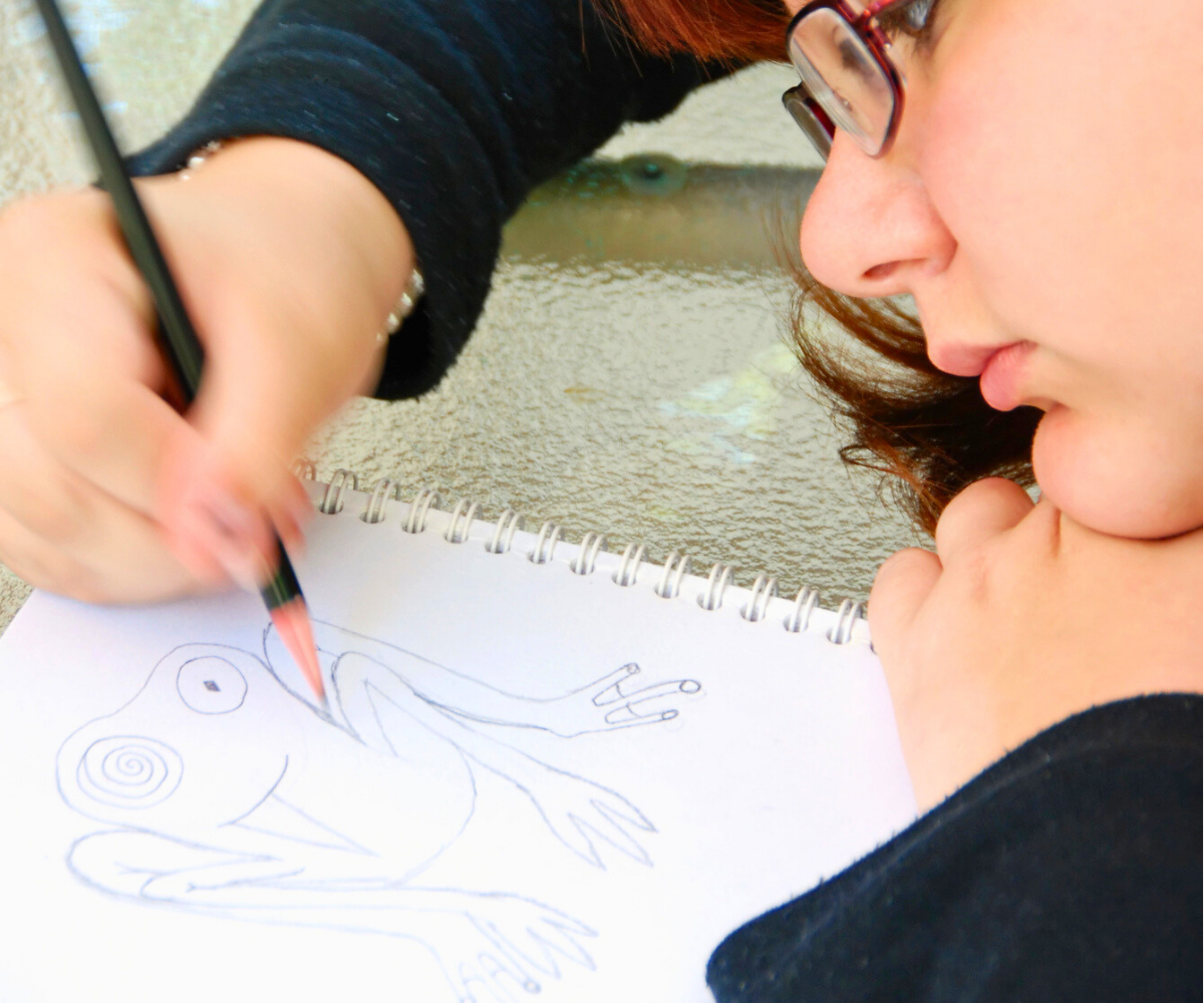 teen girl drawing designs for stickers