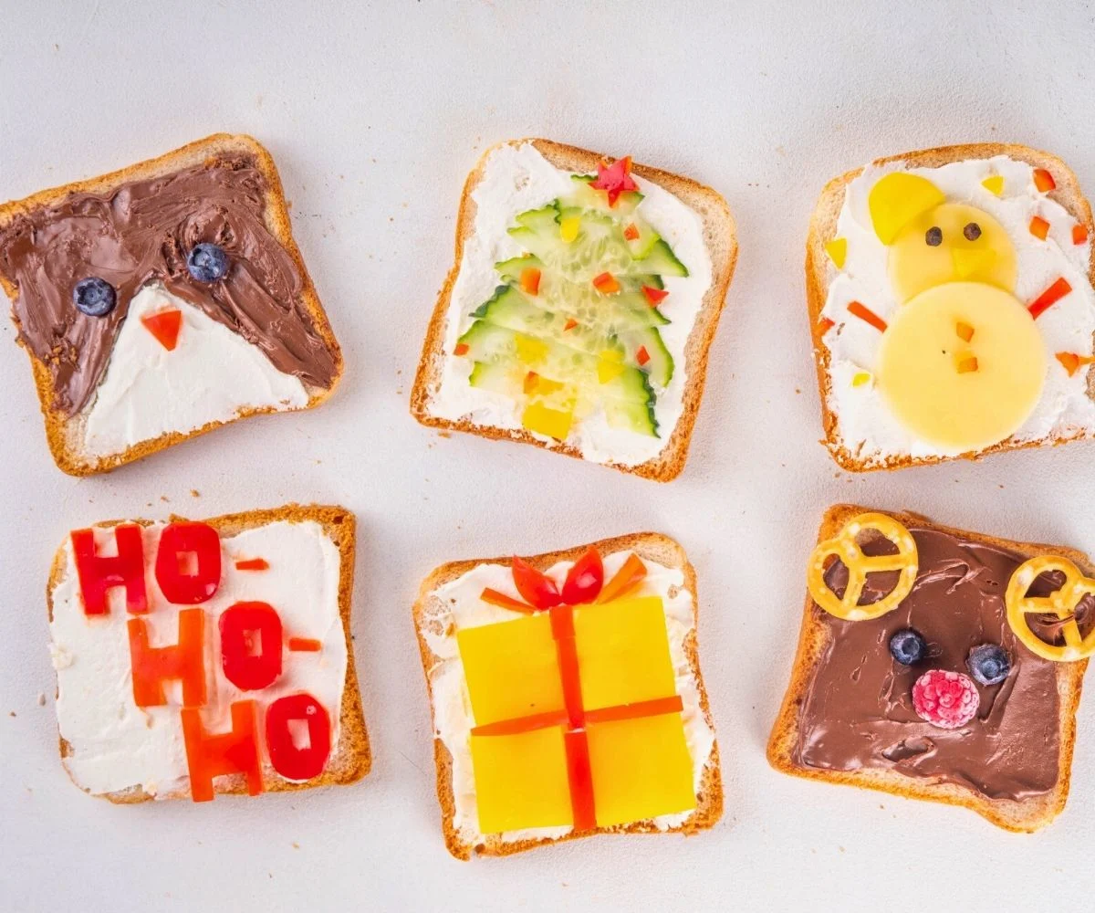 six pieces of toast decorated differently with chocolate, bananas, all kinds of things